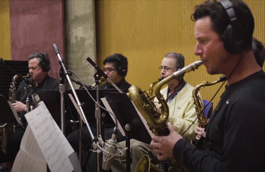 SDSU Jazztecs is a video documenting the production of the 2 CD set including 2 SDSU Jazz Ensembles, 5 SDSU Combos, 3 SDSU Alumni Combos and an All-Star SDSU Alumni Jazz Ensemble. This project was a collaboration between the Jazz Studies program and the Recording Arts Program. About 100 SDSU students were part of this exciting project and it was funded by the SDSU Student Success Fee.